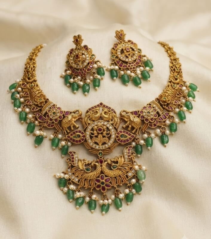 Kempu stone elephant design necklace ?