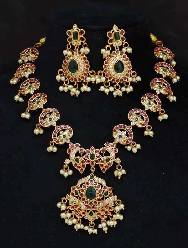 Kempu stone peacock design necklace ?
