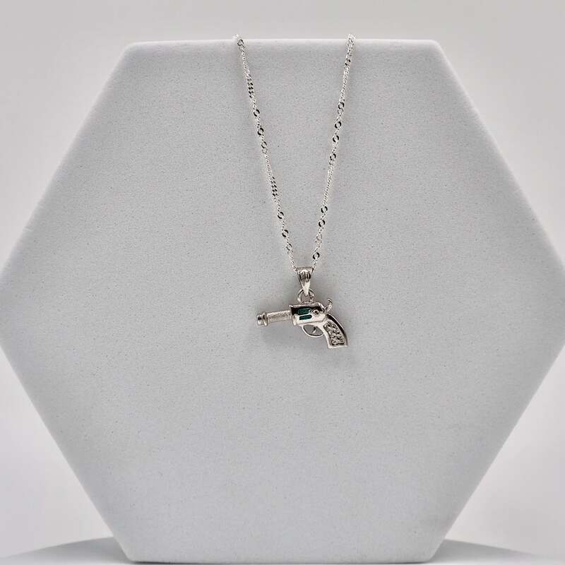 92.50 Silver Gun Shaped Pendent with chain
