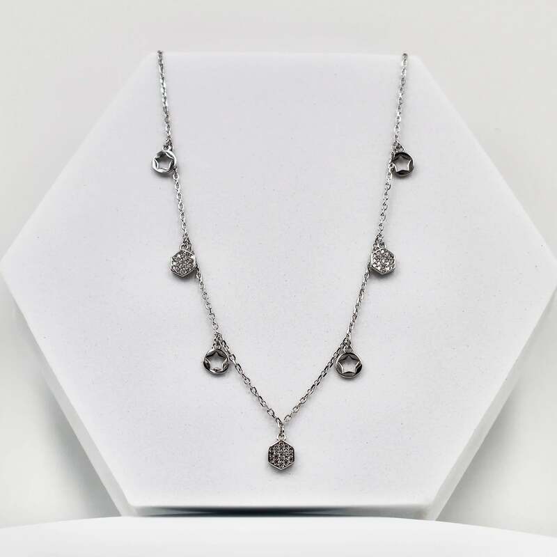 92.50 rose gold mini neckless with 7 dimond hangings