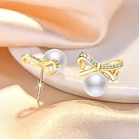 GOLD PLATED AMERICAN DIAMOND STUDDED BOW-TIE SHAPE KOREAN STUD EARRINGS