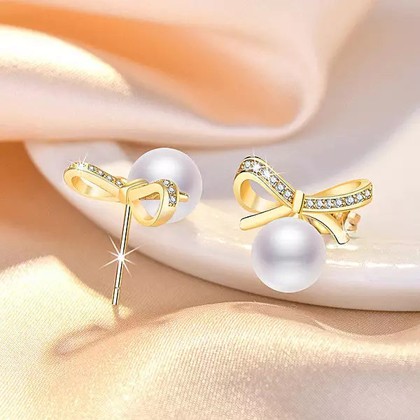 GOLD PLATED AMERICAN DIAMOND STUDDED BOW-TIE SHAPE KOREAN STUD EARRINGS