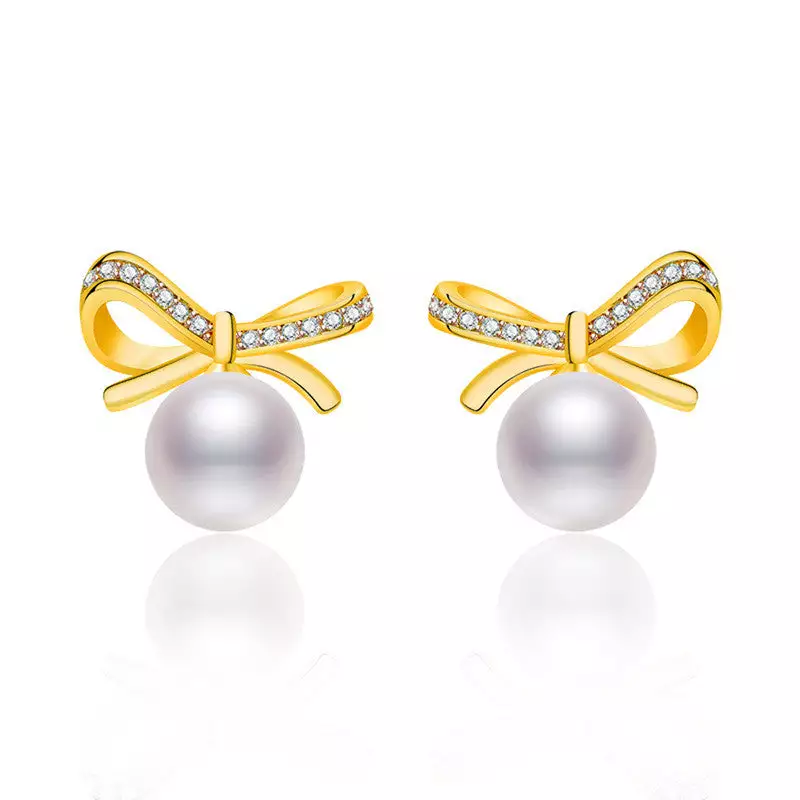 GOLD PLATED AMERICAN DIAMOND STUDDED BOW-TIE SHAPE KOREAN STUD EARRINGS