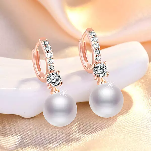 ROSE GOLD PLATED AMERICAN DIAMOND STUDDED CONTEMPORARY PEARL KOREAN DROP EARRINGS