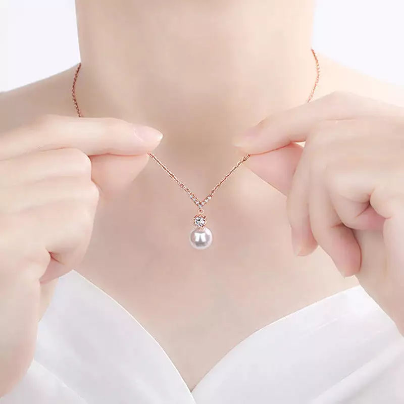 ROSE GOLD PLATED AMERICAN DIAMOND STUDDED CONTEMPORARY KOREAN PENDANT