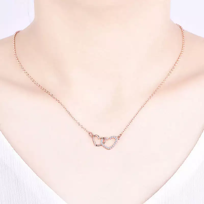 ROSE GOLD PLATED AMERICAN DIAMOND STUDDED DUAL HEART CONTEMPORARY KOREAN PENDANT