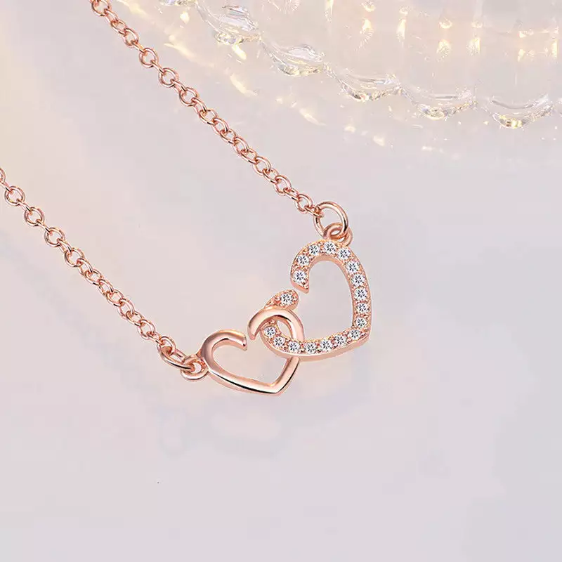 ROSE GOLD PLATED AMERICAN DIAMOND STUDDED DUAL HEART CONTEMPORARY KOREAN PENDANT