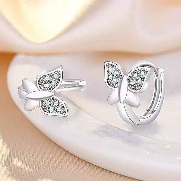 SILVER PLATED AMERICAN DIAMOND STUDDED BUTTERFLY SHAPE KOREAN HOOP EARRINGS&nbsp;
