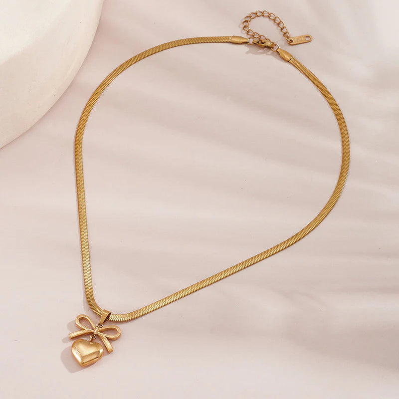 GOLD PLATED ANTI TARNISH BOW KNOT HEART THEMED PENDANT