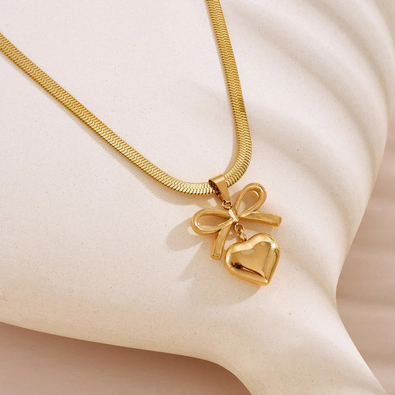 GOLD PLATED ANTI TARNISH BOW KNOT HEART THEMED PENDANT