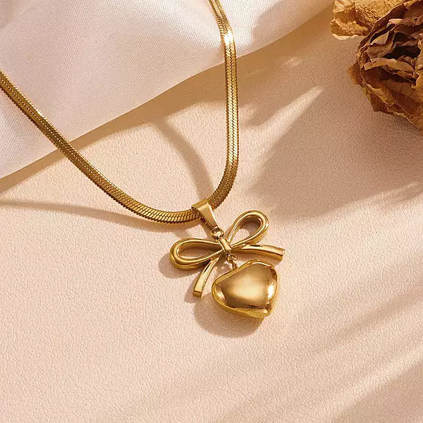 GOLD PLATED ANTI TARNISH BOW KNOT HEART THEMED PENDANT