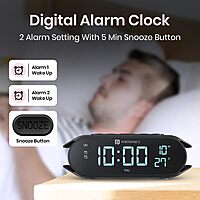 Portronics VoltClock – A sleek wireless charger featuring an alarm clock and temperature display. Perfect for bedside use, it combines functionality with modern design for your convenience.