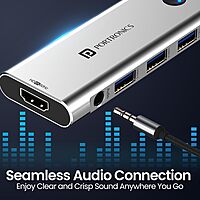 Portronics Mport One – 9-in-1 USB-C Hub features 4K HDMI, USB 3.0 ports, SD card reader, and more. Perfect for expanding connectivity for laptops and devices. Compact and portable design.