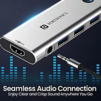 Portronics Mport One – 9-in-1 USB-C Hub features 4K HDMI, USB 3.0 ports, SD card reader, and more. Perfect for expanding connectivity for laptops and devices. Compact and portable design.