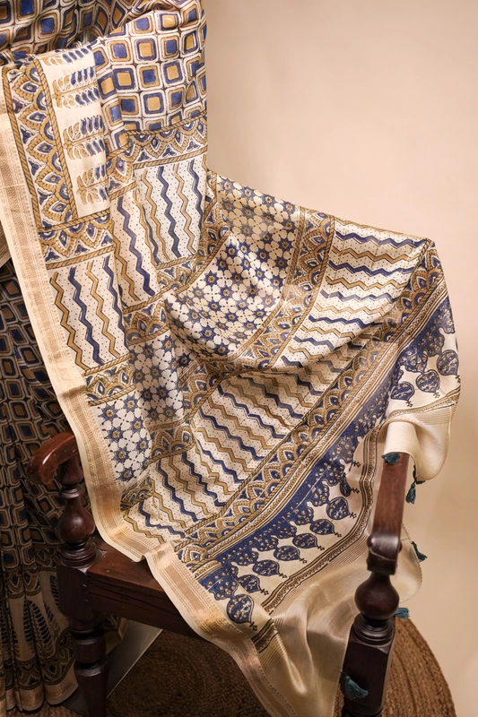 Maheswari silk saree - Indigo Ajrakh Geometric handblock prints on Ivory saree with floral print blouse
