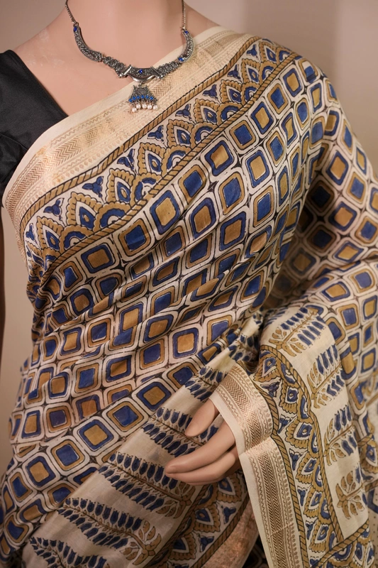Maheswari silk saree - Indigo Ajrakh Geometric handblock prints on Ivory saree with floral print blouse