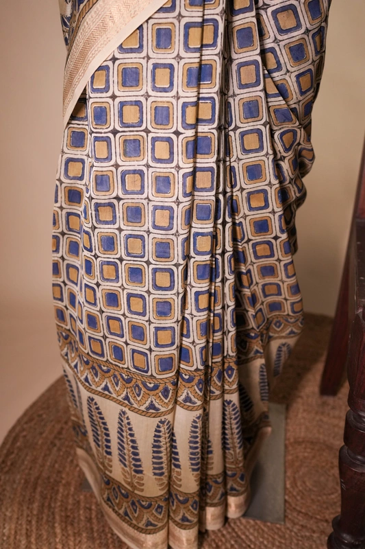 Maheswari silk saree - Indigo Ajrakh Geometric handblock prints on Ivory saree with floral print blouse