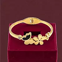 Floral and Butterfly Bangle Bracelet with Black Enamel Detail