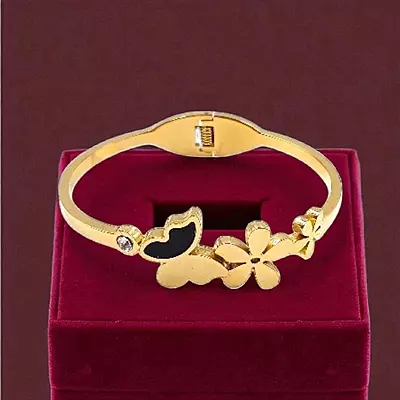 Floral and Butterfly Bangle Bracelet with Black Enamel Detail