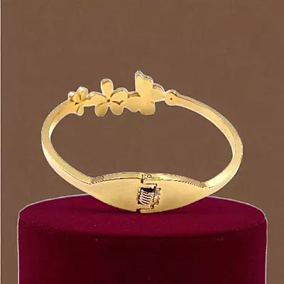 Floral and Butterfly Bangle Bracelet with Black Enamel Detail