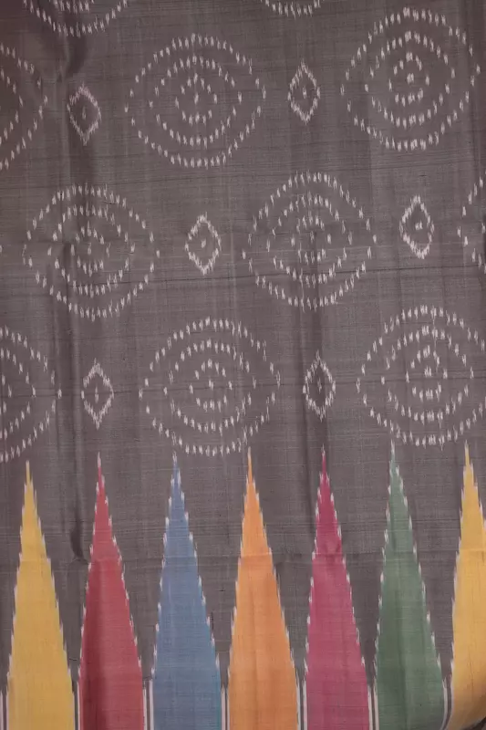 Pastel charcoal grey ikat silk saree with ikat blouse