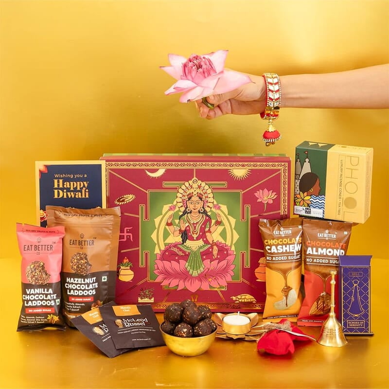 Eat Better Co Samriddhi Gift Hamper with Laxmi Design for Diwali - 11 Item Gift Pack - Dry Fruit Laddoos, Chocolate Coated Nuts with Phool Incense Cones, Golden Bell & Lanten Diya | Diwali Gifting Box