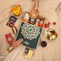 Eat Better Co Prakriti Diwali Gift Hamper with Jute Tray - 10 Item Gift Pack - Dry Fruits Laddoo, Chocolate Coated Nuts with Phool Incense Cones & Lanten Diya | Diwali Gift Box for Friends & Family