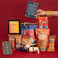 EAT BETTER CO Yaadon Ka Dabba 10-Item Rakhi Gift Hamper Evil Eye Rakhi, Chocolate Coated Almonds, Hazelnut Dry-Fruit Laddoos, Uno & More |for Brother Rakhi Gift Combo Set