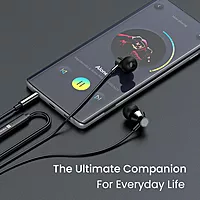 Portronics Conch Tune A – 3.5mm Earphones with Mic, featuring a durable braided cable for tangle-free use, delivering clear sound quality and comfort for an enhanced listening experience.