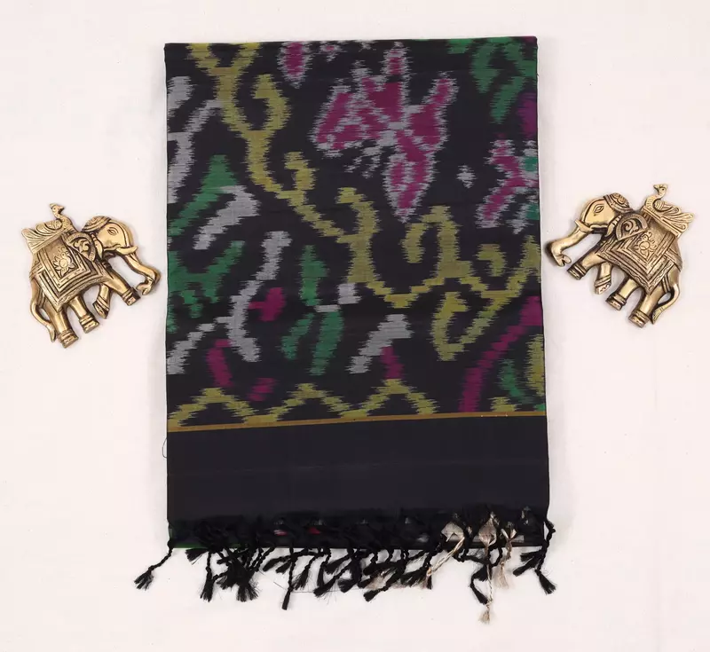 Black ikat silk saree with multicolour temple motifs, zari border and ikat blouse
