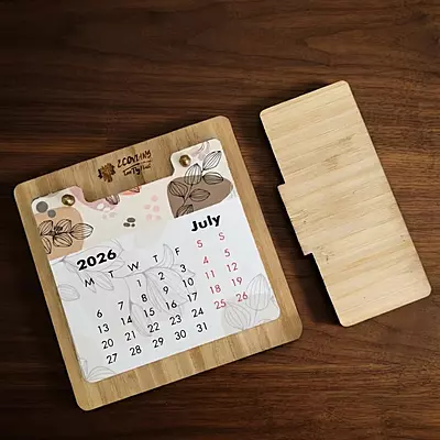 Bamboo calendar with natural wooden frame for an eco-friendly desk accessory Bamboo calendar with natural wooden frame for an eco-friendly desk accessory