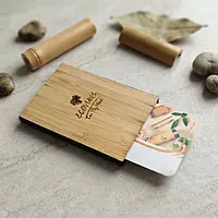 Bamboo visiting card holder with sliding knob for easy business card access