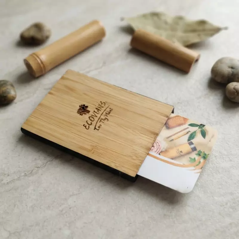 Bamboo visiting card holder with sliding knob for easy business card access