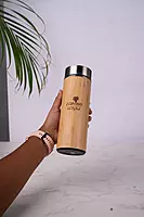 Reusable bamboo water bottle with insulated steel interior Reusable bamboo water bottle with insulated steel interior