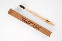 Bamboo toothbrush with charcoal infused soft bristles Bamboo toothbrush with charcoal infused soft bristles