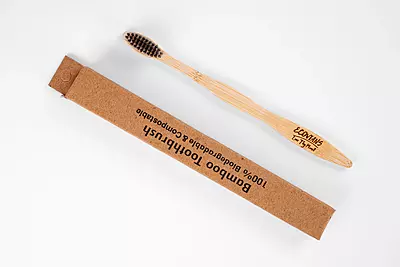 Bamboo toothbrush with charcoal infused soft bristles
