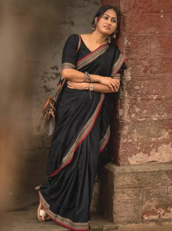 Plain black cotton saree with simple red border