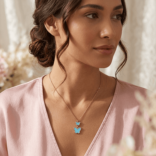 Elegant Rose Gold Butterfly Necklace with Blue Inlay