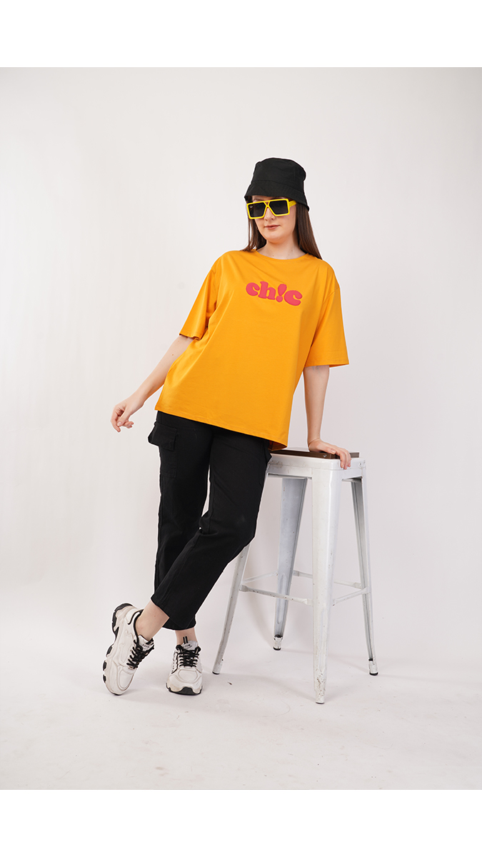 Trendy Mustard Yellow Women's Loose Fit Printed T-Shirt – Lycra 180 GSM | S, M, L Trendy Mustard Yellow Women's Loose Fit Printed T-Shirt – Lycra 180 GSM | S, M, L