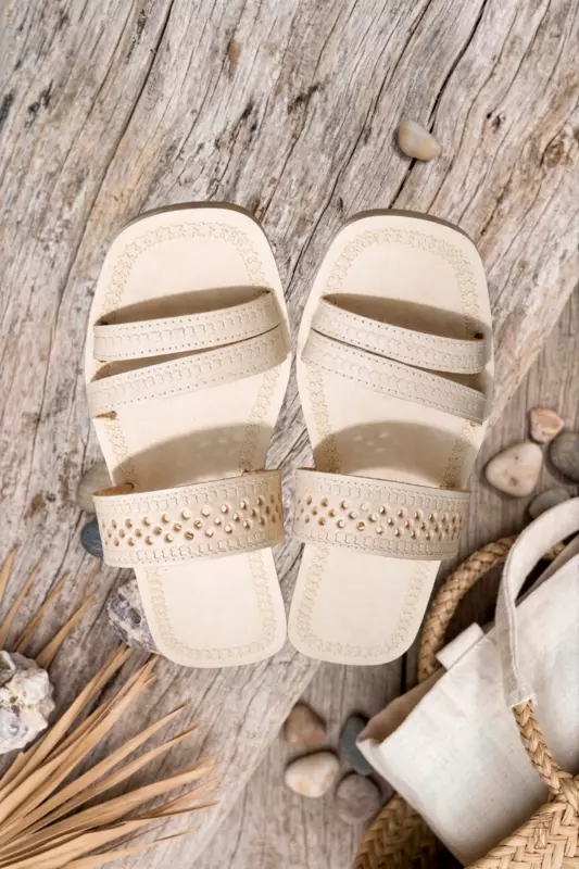 Natural leather women's slide chappal, hand-tooled dot pattern, Chamba — Yatrika Crafts