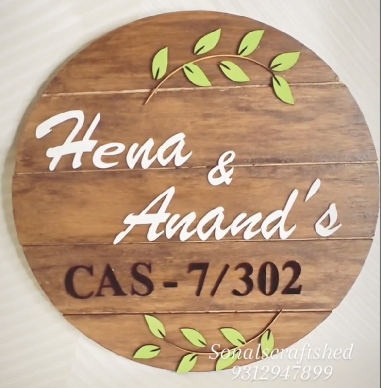 Elegant Circular Wooden Nameplate with personalized text and artwork