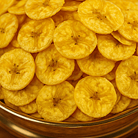 Sliced raw nendran bananas with coconut oil ingredients | Worth2Deal