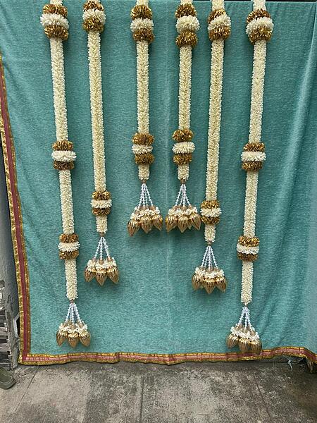 Cloth garland with with gold veni & lotus hangings