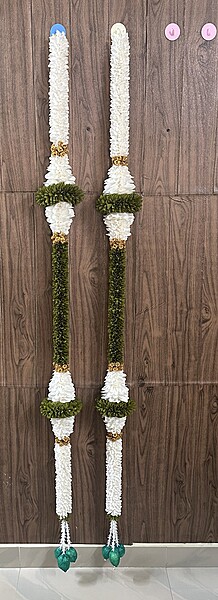 Cone garland with buds hanging