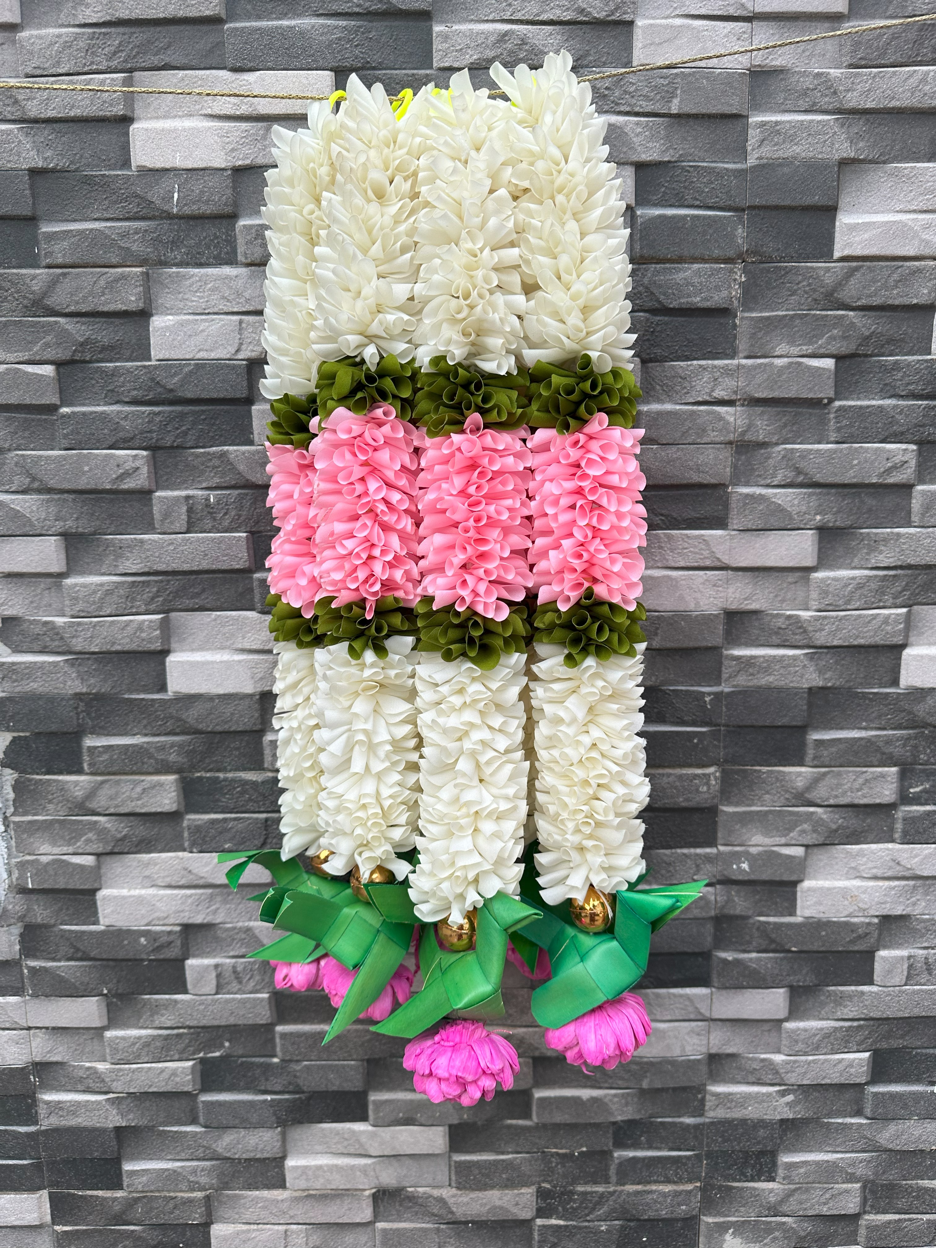 Cloth garland with palm parrot hanging