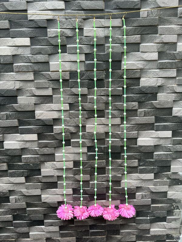 Marigold with plastic bud string