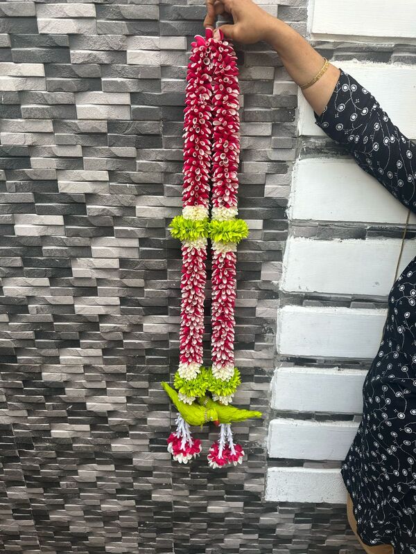 Parrot with cloth garland