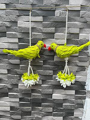 Plastic parrot with parrot hangings