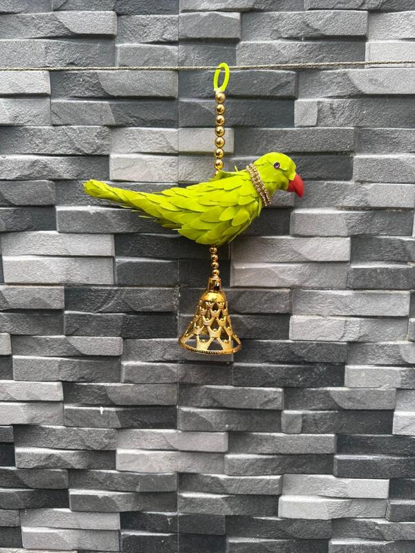 Plastic parrot with bell hanging