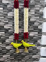 Cloth garland with parrot hangings